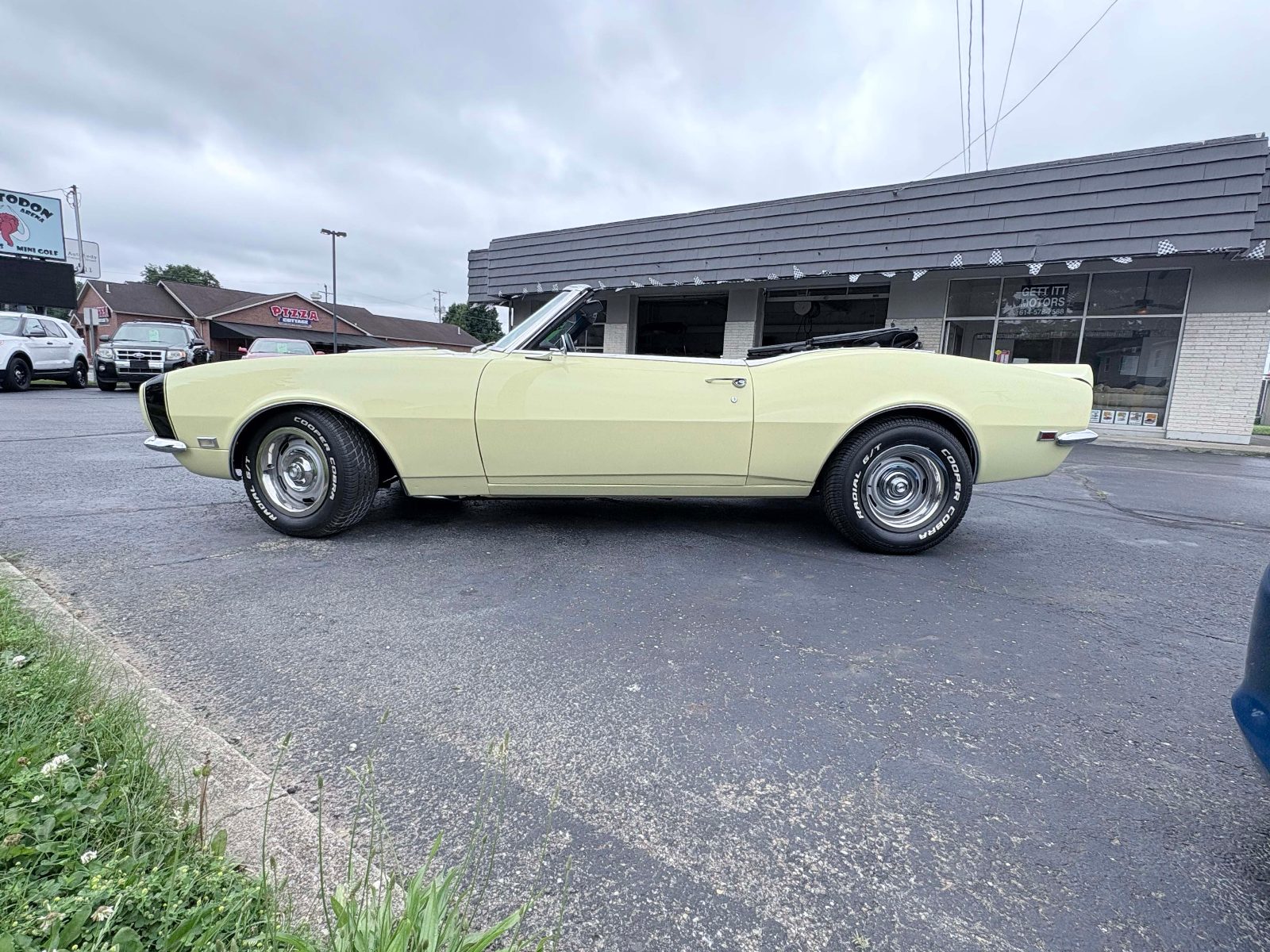 Yellow 1968 Chevrolet Camaro SS convertible side profile
